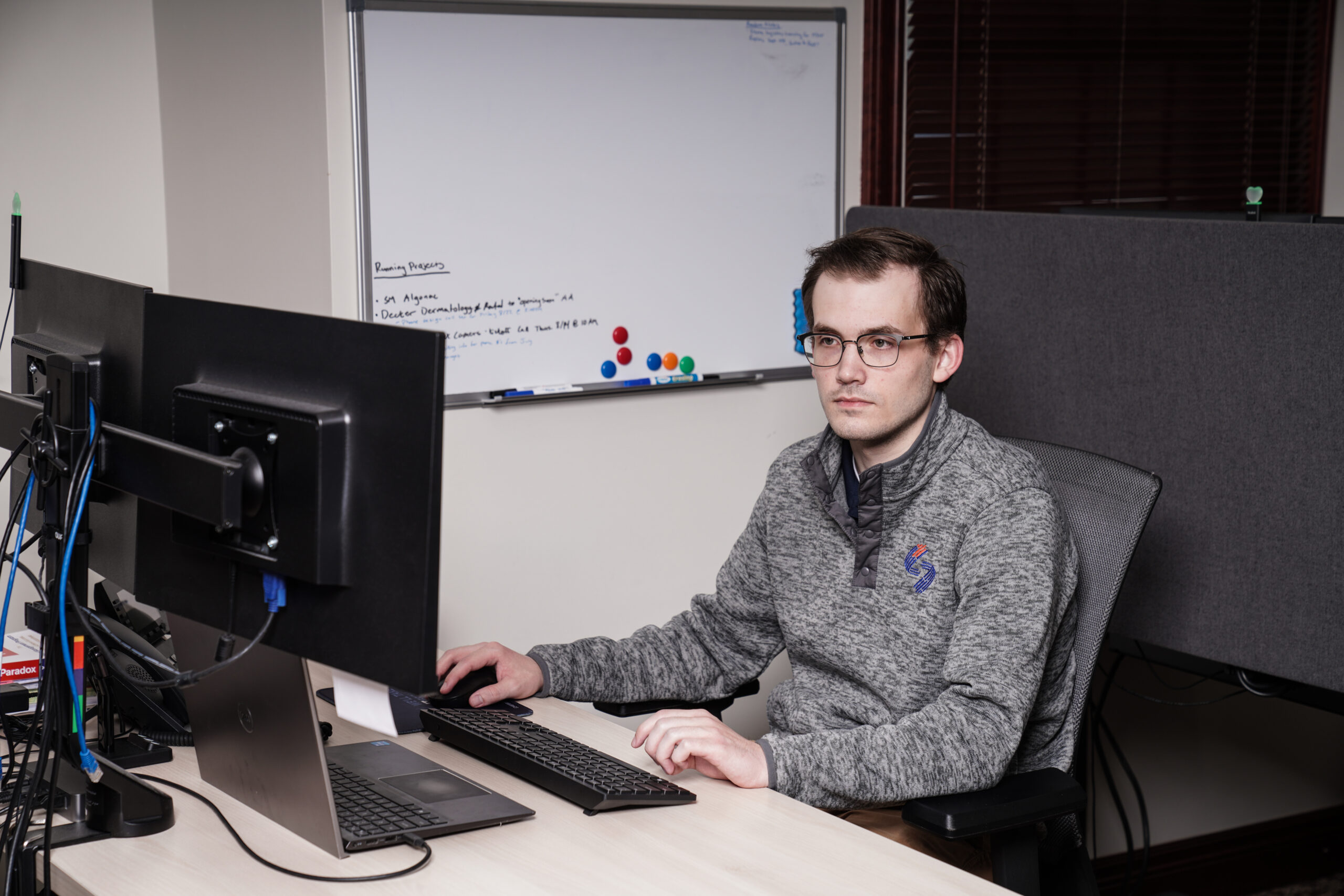 Simply Technology team member helping a Metro Detroit business